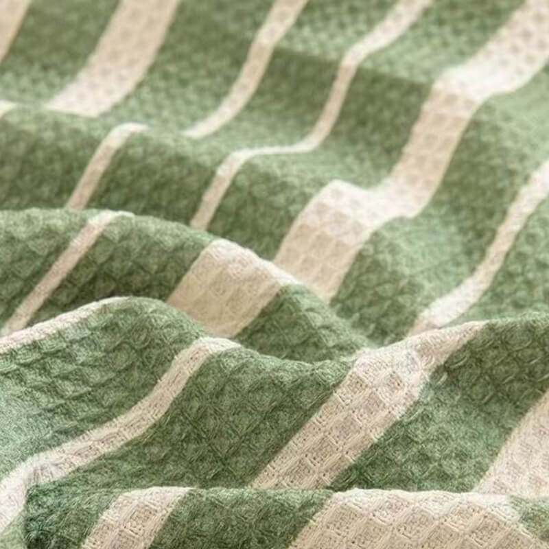 Housse de canapé multicolore à motif géométrique - Design moderne pour une maison élégante