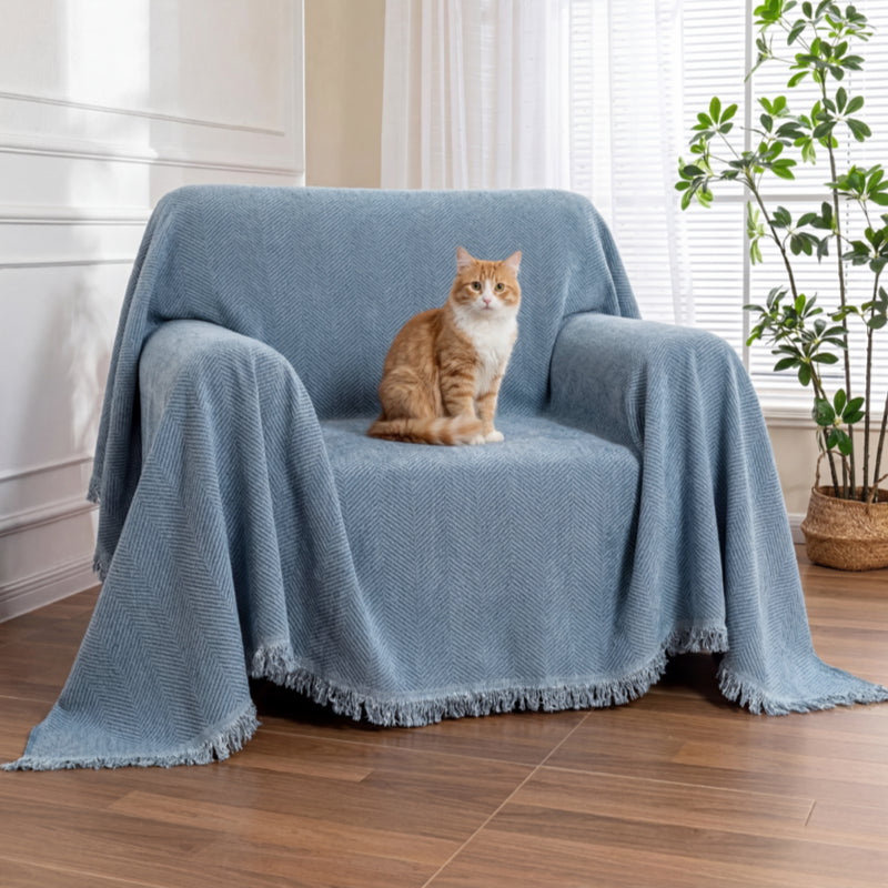 Couverture en chenille à chevrons et pompon pour canapé