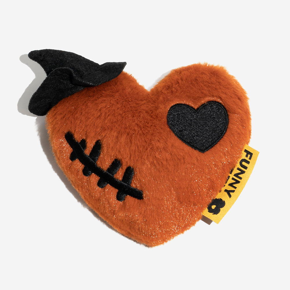 Torn-patch heart, cider-orange plush—I cast squeak spells at night.