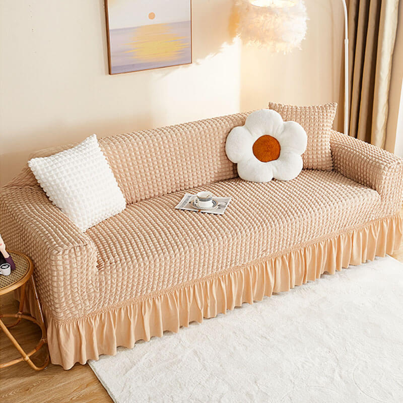 غطاء كرسي بذراعين Seersucker غطاء أريكة مطاطي ملفوف بالكامل مع تنورة كشكش